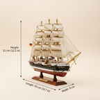 Passat wooden ship model dimension diagram showing length 50 cm (19.7 in), width 9 cm (3.5 in), height 31 cm (12.2 in), front 3/4 angle view on cream white background