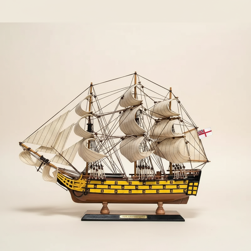 HMS Victory wooden warship model side profile – full-length yellow and black gun port stripe three masts White Ensign flag