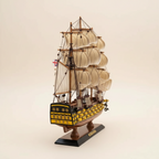 HMS Victory ship model rear view – ornate stern yellow-black painted hull handcrafted wooden nautical collectible

