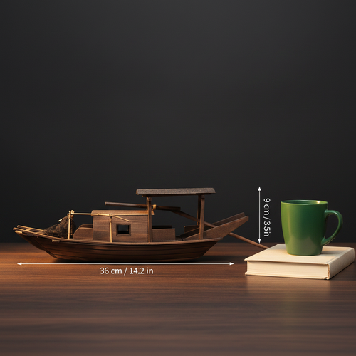Chinese river junk fishing boat model size comparison — 36 cm long × 9 cm tall (14.2 in × 3.5 in), shown beside a book and green mug for scale
