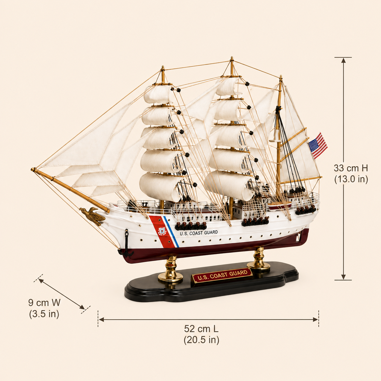 U.S. Coast Guard wooden tall ship model size chart showing dimensions of 52 cm long, 9 cm wide and 33 cm high, equivalent to 20.5 by 3.5 by 13.0 inches.