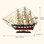American wooden tall ship model size chart showing dimensions of 60 cm long, 14 cm wide and 43 cm high, equivalent to 23.6 by 5.5 by 16.9 inches.