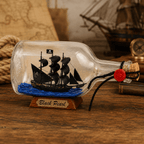Black Pearl Ship in a Bottle – Pirate Ship Nautical Decor - Ocean Relic Studio- Handcrafted Wooden Ship Model