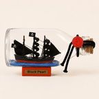 Black Pearl Ship in a Bottle – Pirate Ship Nautical Decor - Ocean Relic Studio- Handcrafted Wooden Ship Model
