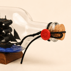 Black Pearl Ship in a Bottle – Pirate Ship Nautical Decor - Ocean Relic Studio- Handcrafted Wooden Ship Model