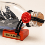 Black Pearl Ship in a Bottle – Pirate Ship Nautical Decor - Ocean Relic Studio- Handcrafted Wooden Ship Model