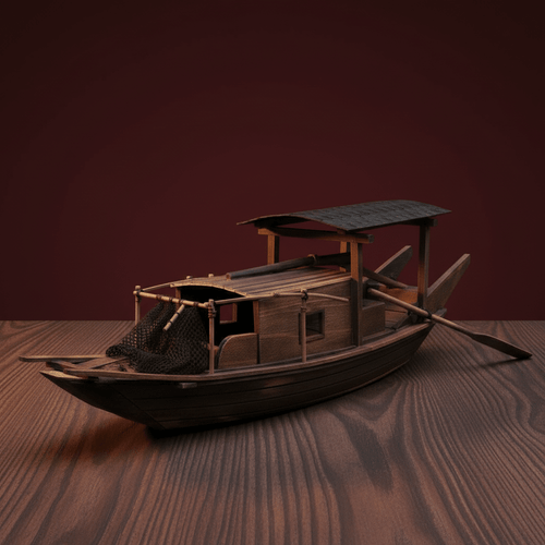 3/4 front view of a Chinese river junk fishing boat model on a wood-grain surface, showing fishing net, bamboo poles, cabin structure, and wooden oar