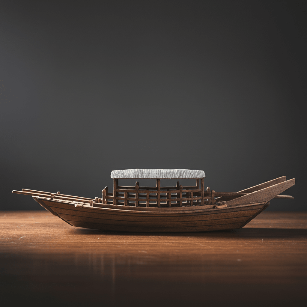 Side view of a handcrafted Chinese river junk model showing straw cabin, open lattice railing, and wooden oars, dark studio background