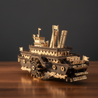 Wooden model ship on a reflective surface with a dark background