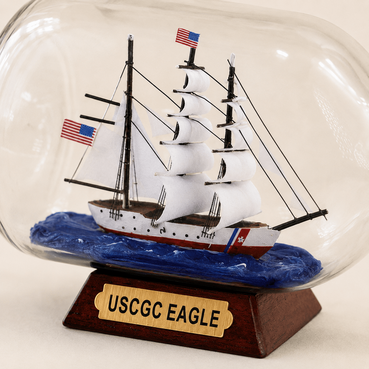 USCGC Eagle Ship in a Bottle – US Coast Guard Tall Ship Nautical Decor - Ocean Relic Studio- Handcrafted Wooden Ship Model