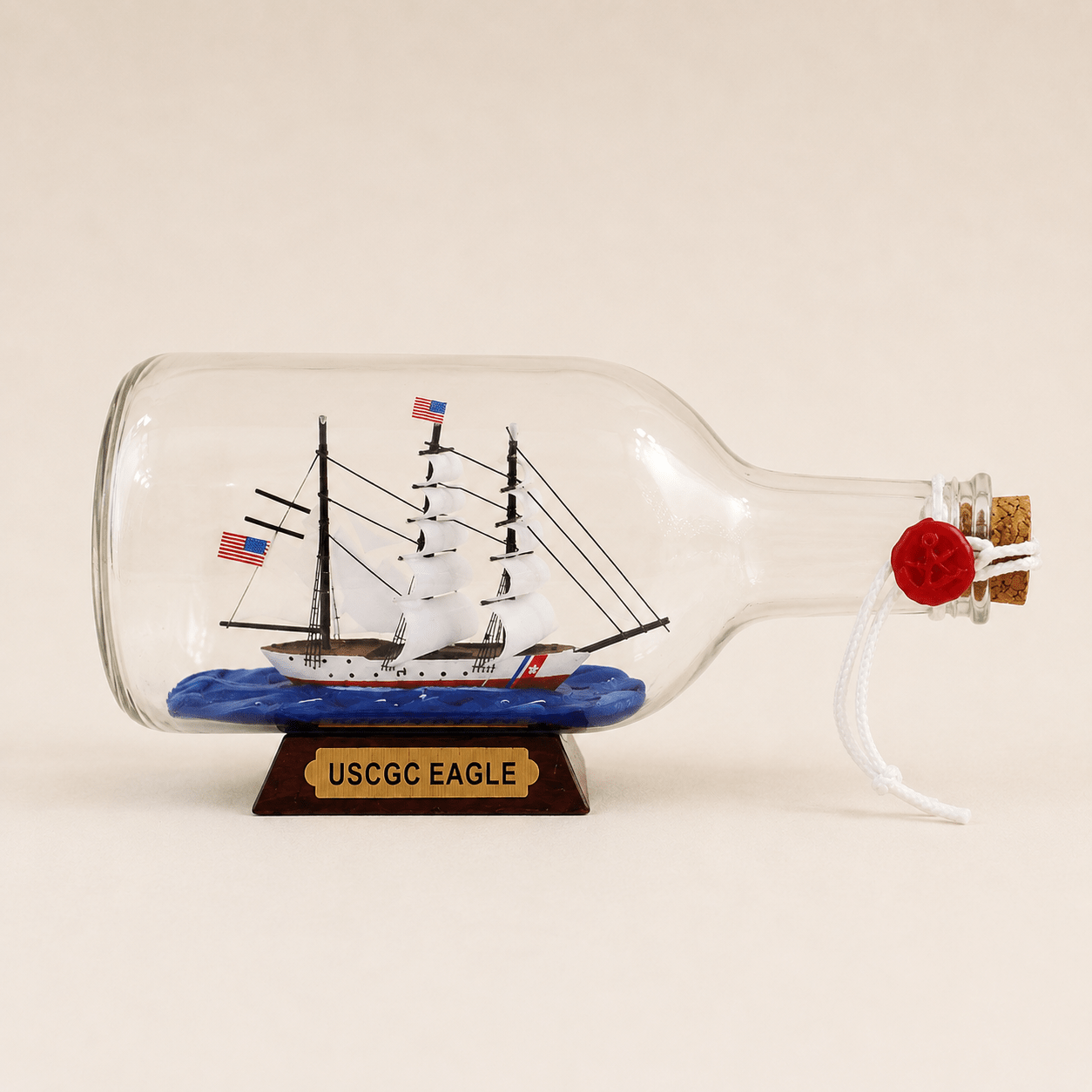 USCGC Eagle Ship in a Bottle – US Coast Guard Tall Ship Nautical Decor - Ocean Relic Studio- Handcrafted Wooden Ship Model